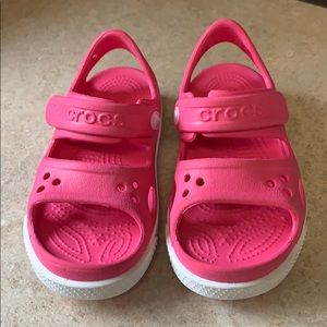 Pink girls Croc sandals with Velcro strap